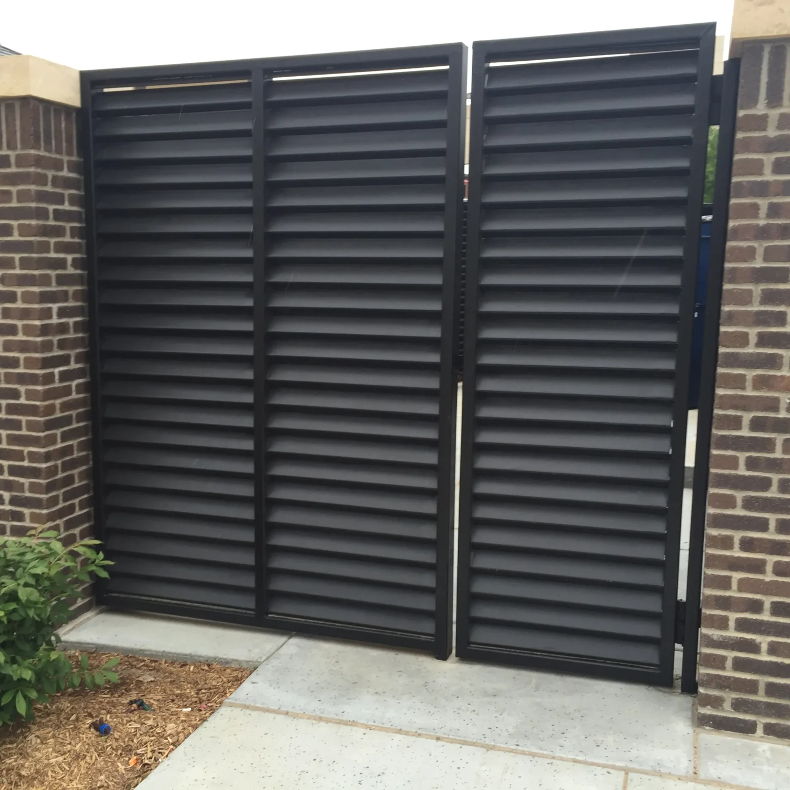 Exterior Louvered Steel Screen Enclosure – View 2